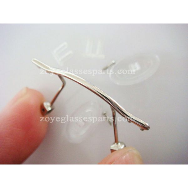 clip on bridge for rimless eyewear with nose pads